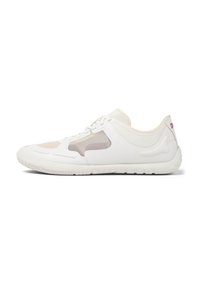 White athletic shoe with mesh panels, curved design, textured sole, and subtle beige accents. Features a lace-up closure and logo detail.