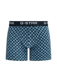 Herenboxers van G-Star met een dambordpatroon, uitgevoerd in tinten blauw en een zwarte tailleband met het G-Star-logo.