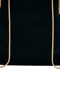 Black velvet bag with a smooth texture, featuring gold-tone hardware and thin metallic accents. Drawstring closure on both sides.