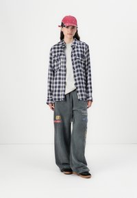 Replay PANTS - Joggebukse - black board