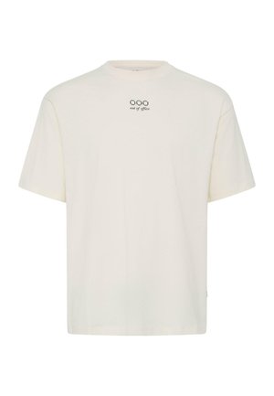 Cremefarbens kurzärmeliges T-Shirt mit kleinem schwarzem Schriftzug "out of office" und drei ovalen Formen, die nahe dem Halsausschnitt zentriert sind.