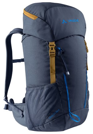 Sac à dos bleu et gris avec une surface texturée, des accents dorés, des straps réglables et une poche latérale en maille. Il dispose d'une fermeture à cordon.