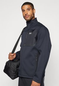 Under Armour SHIELD JACKET - Softshell-jope - black/white
