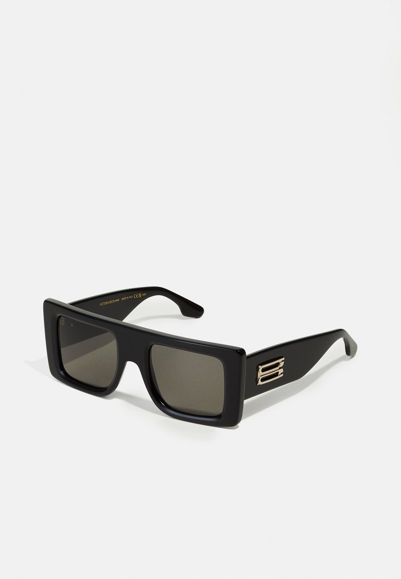 Black square sunglasses with dark lenses. Features a glossy finish, bold frame design, and a gold accent on the temple.