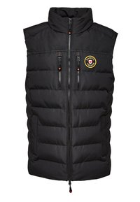 Czarna kamizelka puchowa z wysokim kołnierzem, posiadająca dwie kieszenie na piersi na suwak oraz okrągłe logo po lewej stronie. Pikowany, teksturowany wzór.