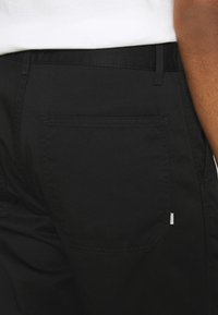 Woodbird DIZZON PANTS - Chinos - black
