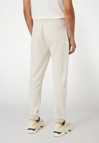 Guess MID WAIST JOGGING - Pantaloni sportivi - beige