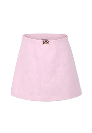 Roze a-lijn rok van textuurstof. Bevat een reliëf bloemenpatroon en een gouden sluiting op de taille.