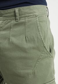 YOURTURN Reisitaskuhousut - khaki