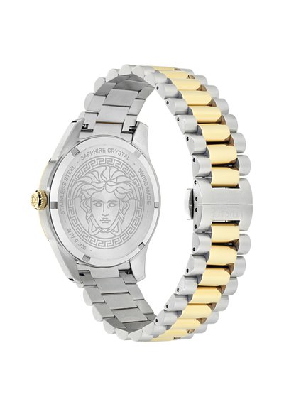 Rozsdamentes acél karóra, kétszínű arany-ezüst szíjjal, zafír kristály üveggel, hátoldalán gravírozott Medúza mintával és tartós kivitelben.