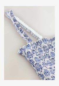 Vybrané, cream blue shell