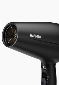 Black BaByliss hair dryer with front air grill, control buttons, and brand name on the side, shown against a white background.