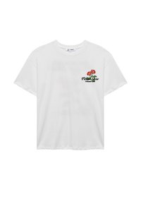 Camiseta de algodón blanca de manga corta. Presenta bordados florales coloridos en el lado izquierdo del pecho, con el texto "Exposición de Flores" debajo del diseño.