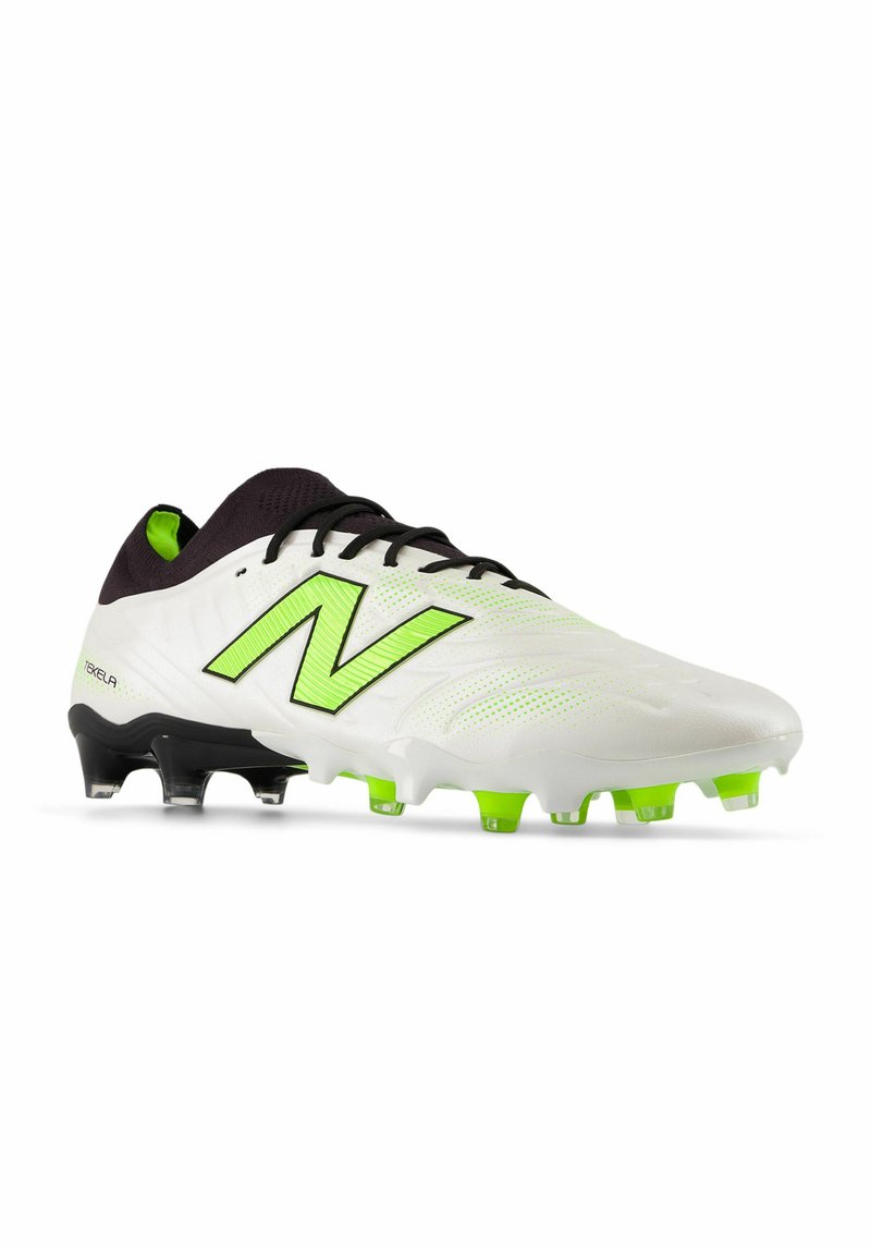 Cleats featuring a white synthetic upper with green accents, black laces, and a textured surface; black and green studded outsole for traction.
