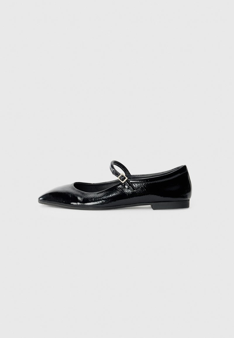 Black patent leather ballet flats with a pointed toe, a thin strap across the foot, and a low heel. Textured surface adds detail.