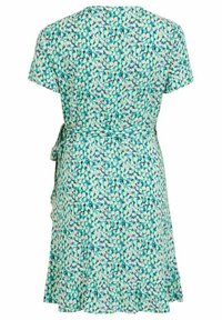 Blommig omlotklänning i en ljus teal-färg med en volangkant. Tyget har ett mönster av små vita, blå och gula blommor. Korta ärmar.