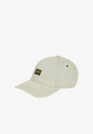 Beige baseballpet met een gebogen klep en een zwarte G-Star Originals logo patch op het voorpaneel.