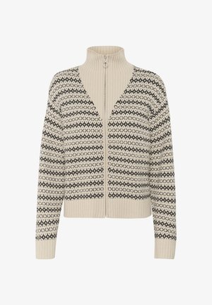 Suéter beige con cremallera y cuello alto, que presenta un patrón geométrico negro en el pecho y las mangas. Puños y dobladillo acanalados.