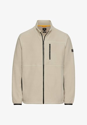 Beige fleecejakke med høj krave, fuldlængde frontlynlås, sort lynlåslomme på brystet og kontrasterende sorte sidepaneler.