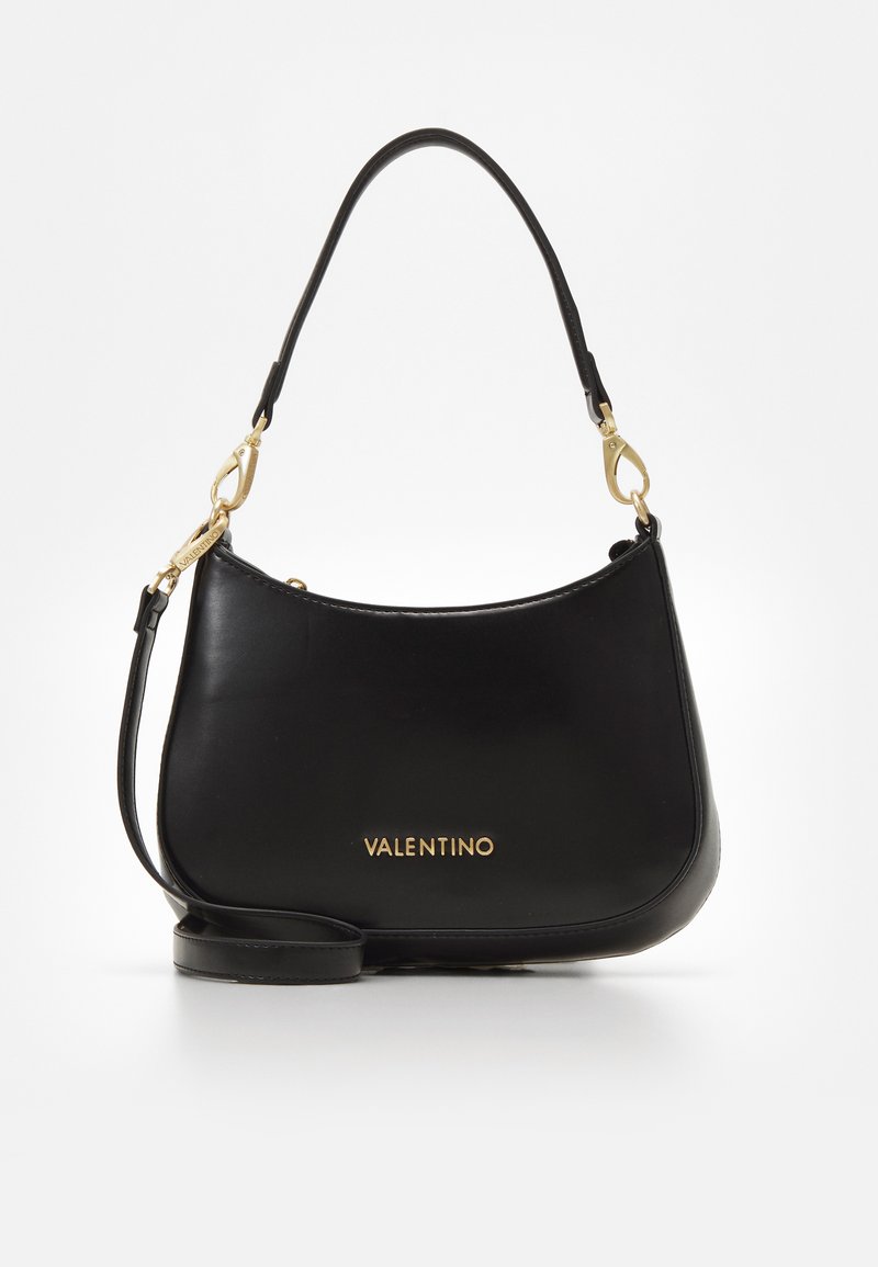 Black leather handbag with a curved silhouette, gold hardware accents, and embossed brand logo. Features a single shoulder strap.