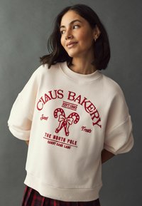 Next CHRISTMAS FRONT GRAPHIC CLAUS BAKERY - Sportinis megztinis - red ecru