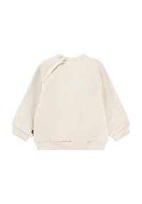 Felpa color beige chiaro, in morbido cotone, con scollo a girocollo e chiusura a bottoni, polsini e orlo a coste, vestibilità oversized e design semplice.