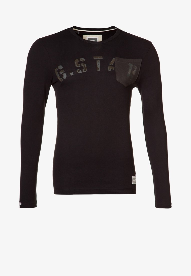 Czarna koszulka z długim rękawem z bawełny, z teksturowanym nadrukiem na piersi i małą kieszonką. Dopasowany krój z okrągłym dekoltem.