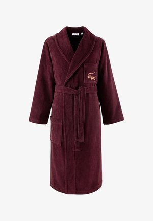 Bordeauxfarbener Bademantel aus weichem, plüschigem Stoff. Verfügt über einen Schalkragen, eine taillierte Gürtel und eine Tasche mit gesticktem Design.