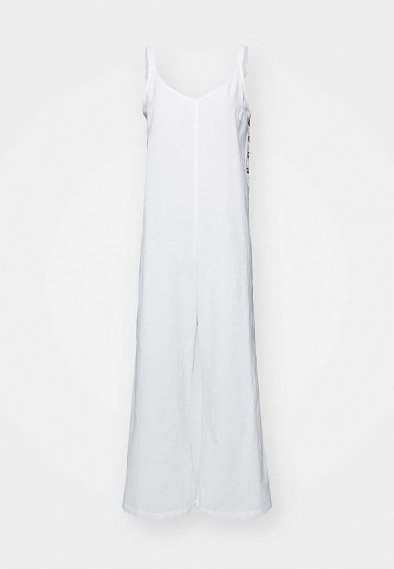 Combinaison en lin blanc avec des jambes larges, bretelles en camisole et décolleté droit. Comprend une couture centrale et un design minimaliste.