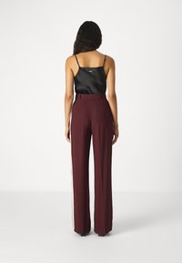 Elisabetta Franchi WOMEN'S PANTS - Kelnės - rouge noir