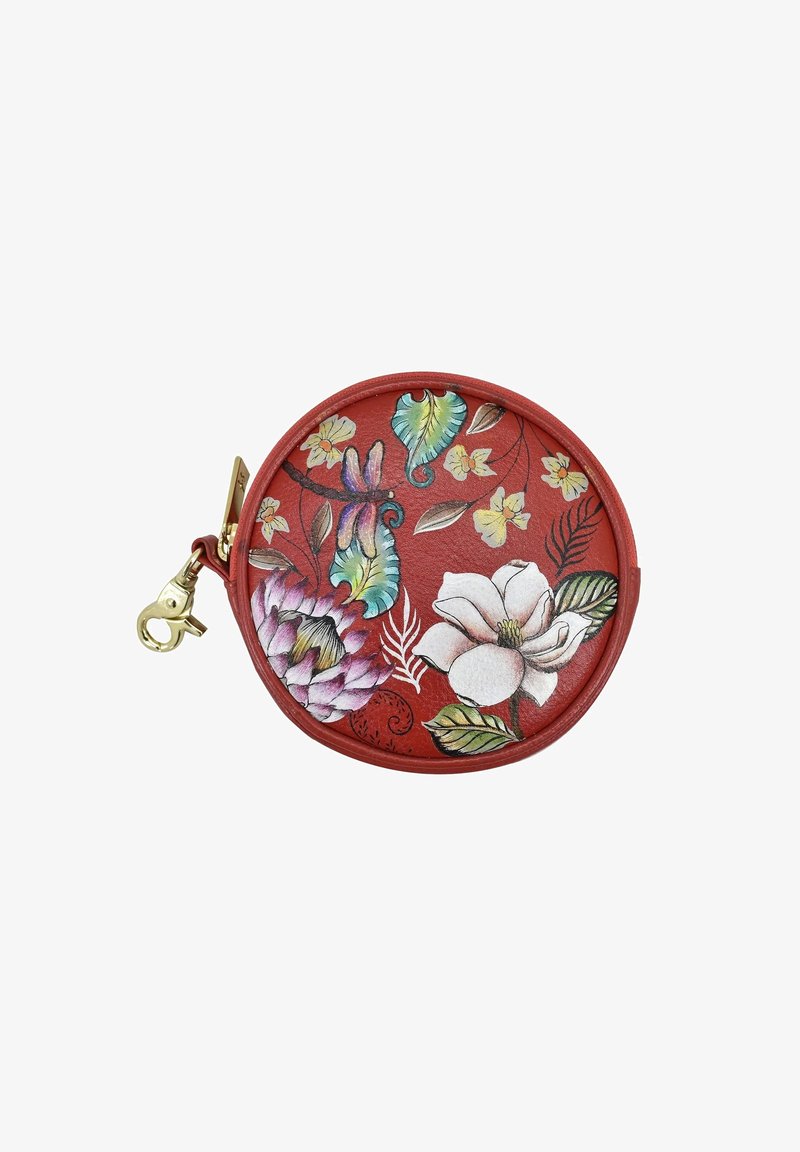 Ronde rode coin purse gemaakt van leer met kleurrijke bloemen- en bladdesigns, voorzien van een gouden metalen rits en clipbevestiging.