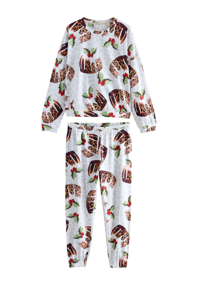 Pyjamapas met lange mouwen, voorzien van een witte achtergrond met een herhaald patroon van taarten en hulstbladeren. Zachte stof met een elastische tailleband.