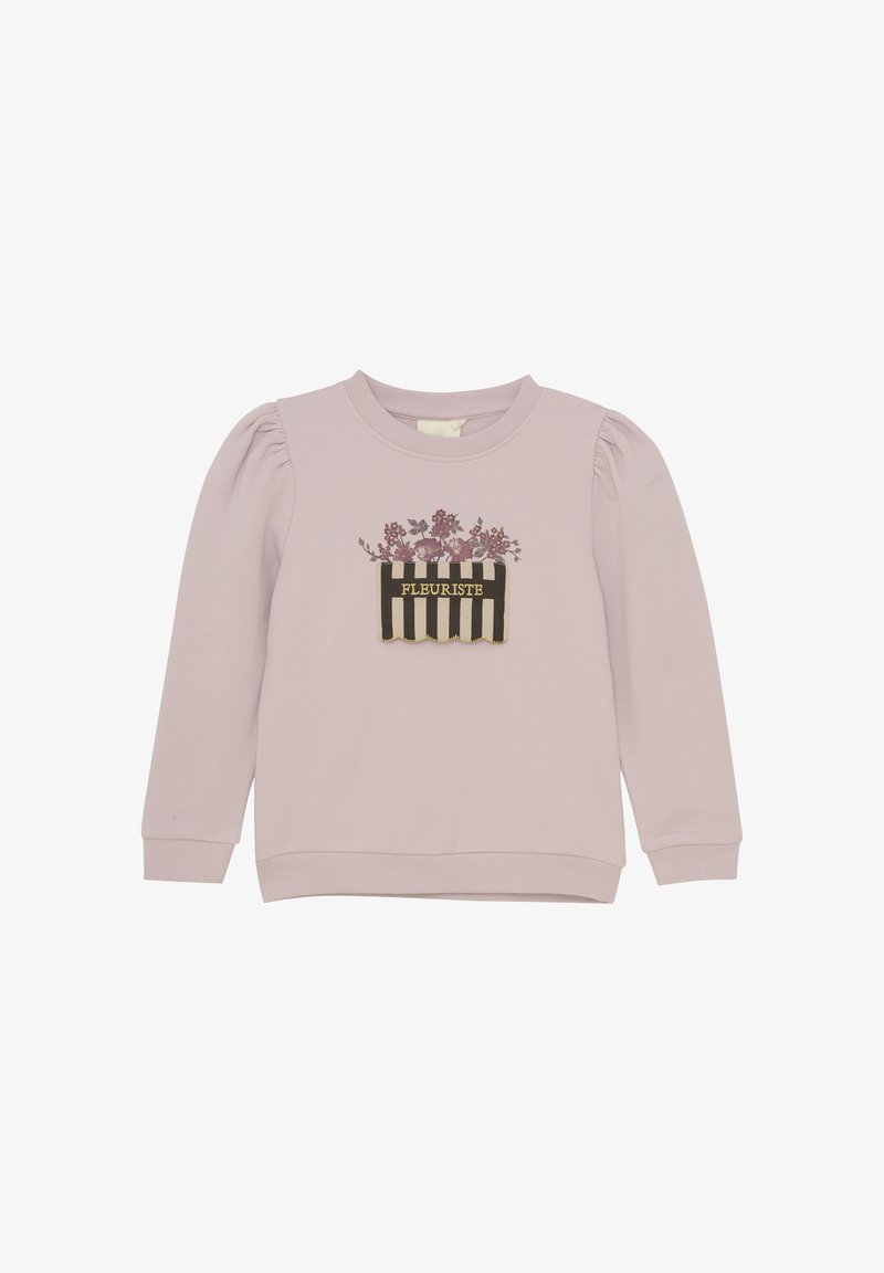 Lila sweatshirt med puffärmar, med ett blommönster och "FLORISTE"-text på ett svart-vitt randigt lappar. Tillverkad i bomull.