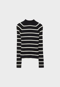 Pull à col roulé côtelé noir et blanc à rayures, avec des manches longues et une coupe ajustée. Tissu texturé avec un col haut.