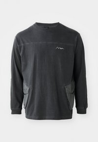 Black long-sleeve shirt with a crew neck. Features two side pockets and a mountain graphic on the chest. Made from soft cotton material.