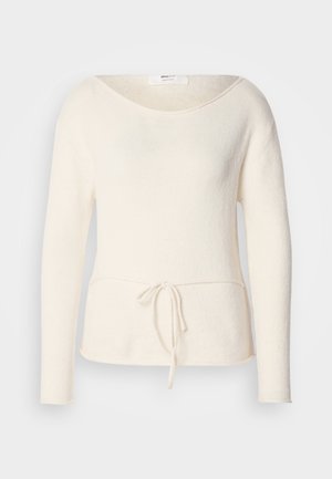 Kreemjas pikkade varrukatega kampsun ümmarguse kaelusega ja ees vööga, valmistatud pehmest alpakasegusest kangast.