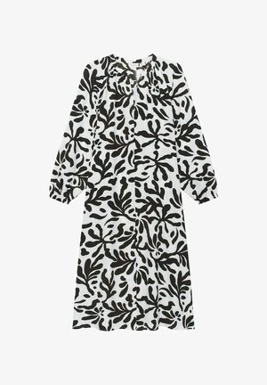 Zwart-witte jurk met bloemenpatroon, lange mouwen, ronde hals en elastische manchetten, gemaakt van lichte stof.