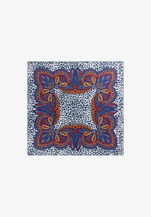 Square silk scarf featuring intricate paisley design in red, blue, and orange on a white background with black leopard spots.