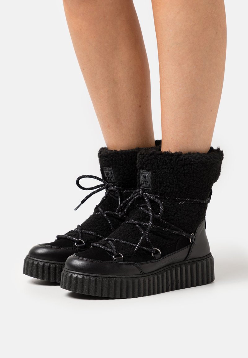 marco polo ankle boots