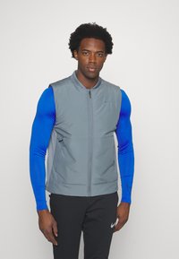 Nike Performance UNLIMITED - Weste - smoke grey