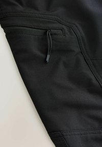 Black outdoor pants featuring smooth fabric, a side zip pocket, and detailed stitching. The design is functional with a flexible fit.