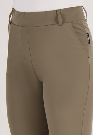Khaki broek met gladde, rekbare stof; beschikt over zijzakken en een merketiket op de tailleband; strakke pasvorm.