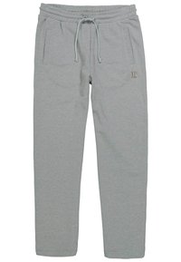 Grå sweatpants lavet af blødt stof med to sidelommer, et elastisk taljebånd og en snor, der har et lille guld logo på siden.