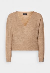 Pull-over beige en tissu tricoté texturé. Présente un col en V profond et des manches longues, avec une taille cintrée et des poignets côtelés.