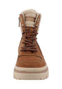 Brune ruskinds lace-up ankelstøvle med blødt pelsfor, gummisål og sølv lynlåsdetalje på siden. Mønstret brune og hvide snørebånd.