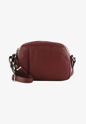 Red leather crossbody bag with a rounded top, zip closure, and adjustable strap. Textured surface and a flat front pocket detail.