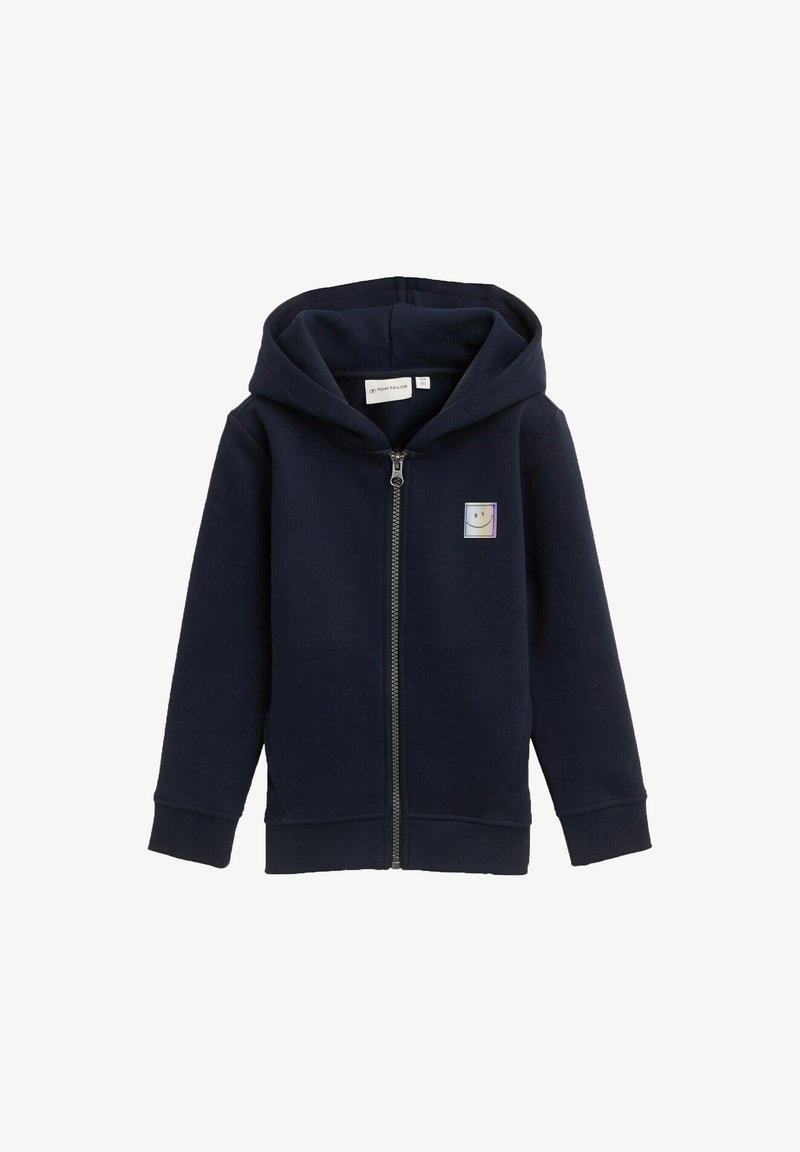 Námornícka zipsová mikina vyrobená z jemnej bavlnenej zmesi s prednou kapsou, pružnými manžetami a štvrtou usmiatou tvárou na ľavej hrudi.