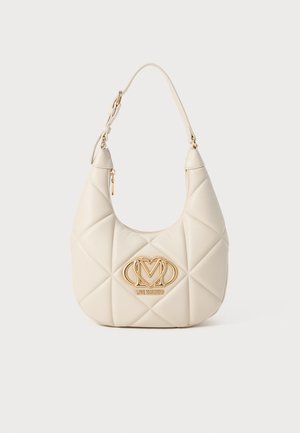 Quilted beige handbag made of synthetic leather, featuring a gold logo plaque and a sturdy shoulder strap. Zipper compartment included.