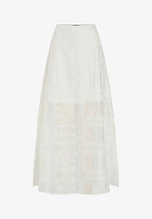 Jupe blanche longue jusqu'à la cheville avec des motifs de dentelle florale disposés en panneaux carrés et une taille cintrée.