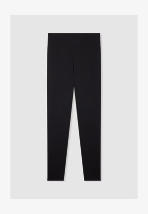 Czarne legginsy o gładkiej strukturze, z wysokim stanem i bez widocznych szwów, zaprojektowane dla komfortu i elastyczności.